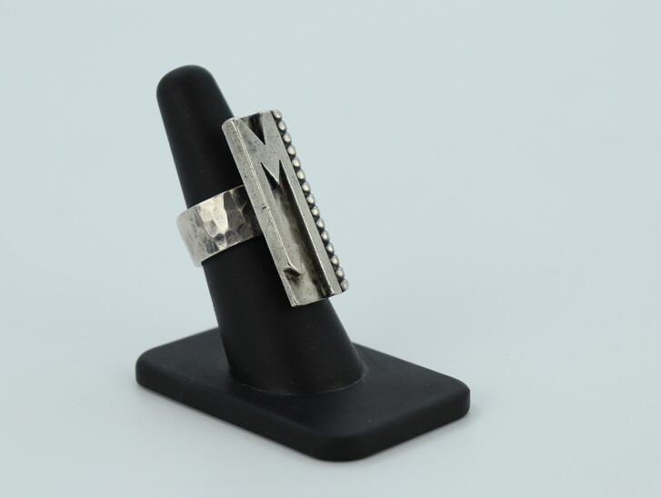 Silver ring with the initial M by Jean Després